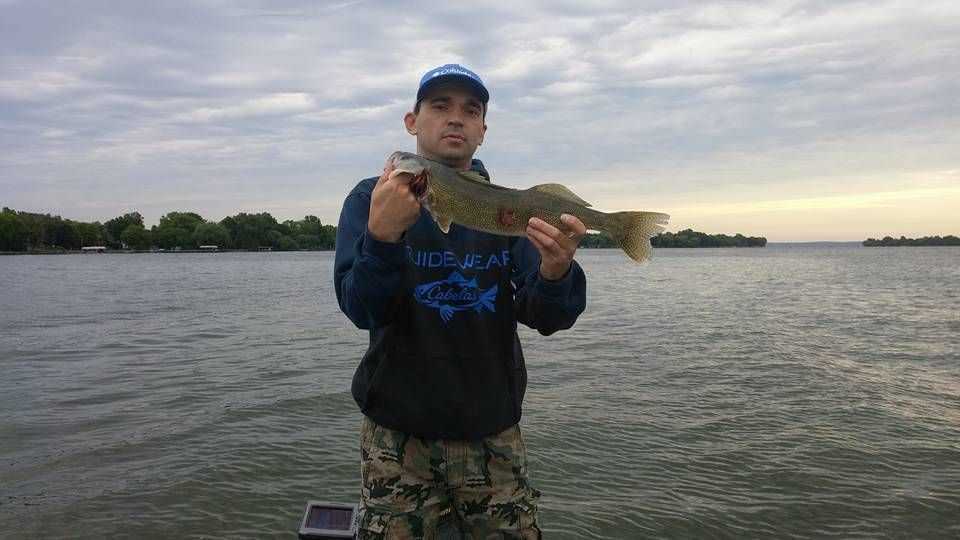 Captain Dennis Ansell with a Walleye